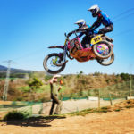 Brett Wilkinson flying high on a motocross bike in Spain