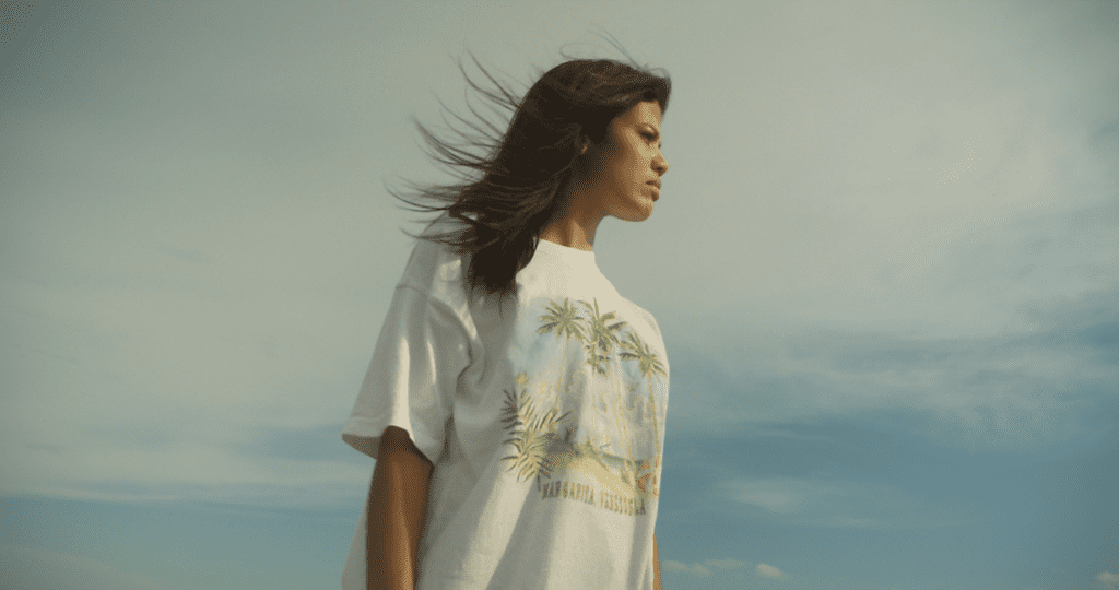 girl looking out to sea from short film confesiones