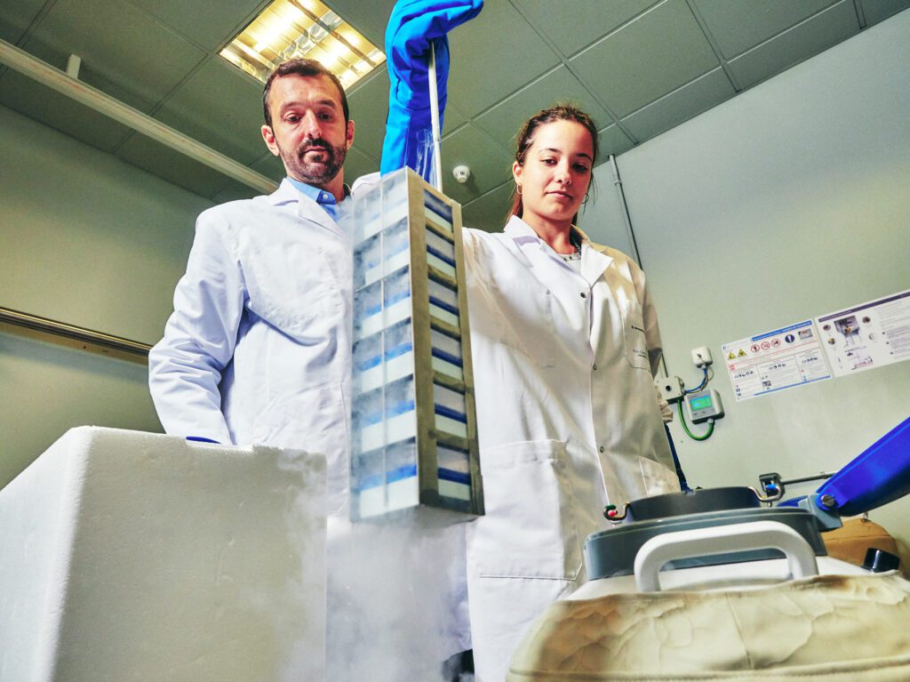 male and female removing samples from Liquid nitrogen 