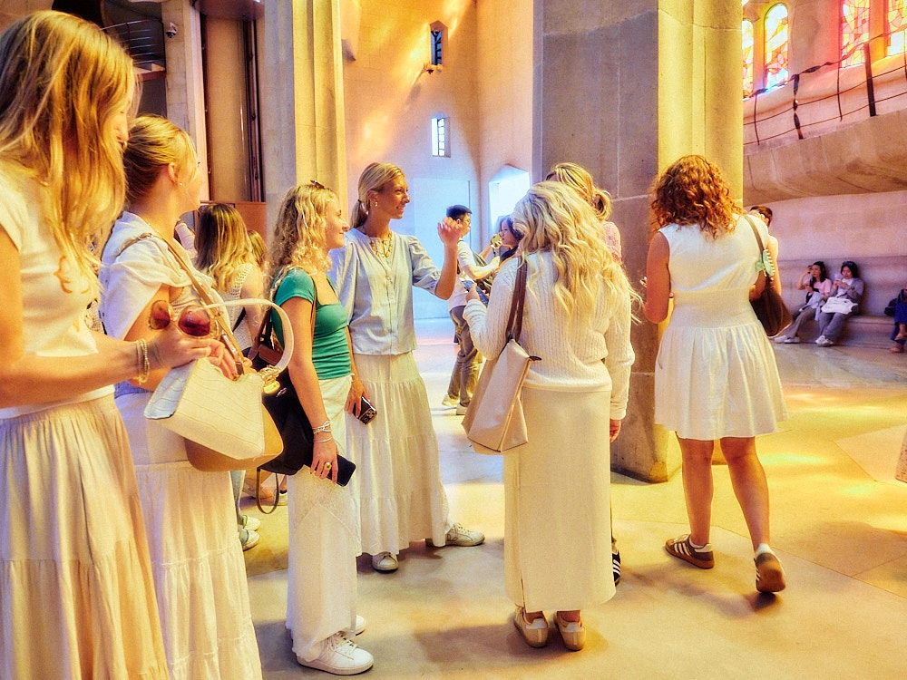 Interior of Sagrada familia , a group of blonde girls