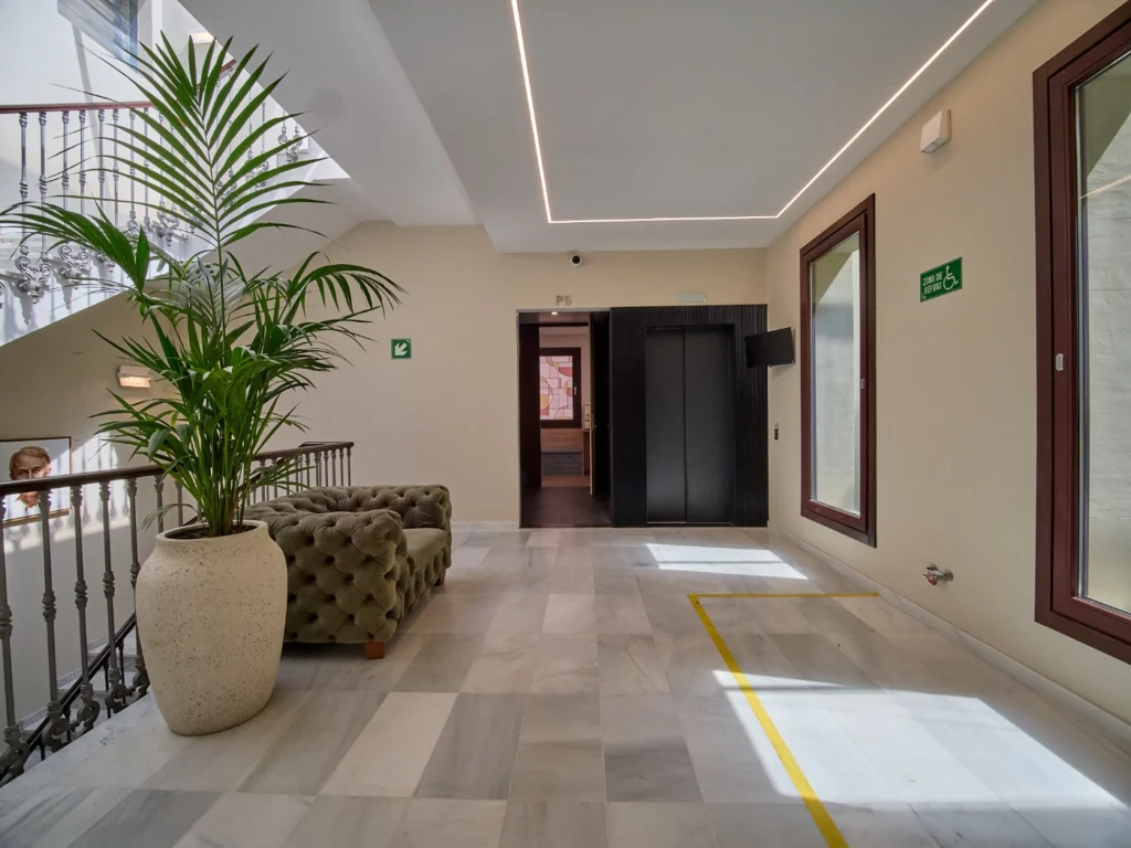  An impressive view of a grand staircase in a premium coworking space, highlighting the building's commitment to exceptional design and spatial quality.