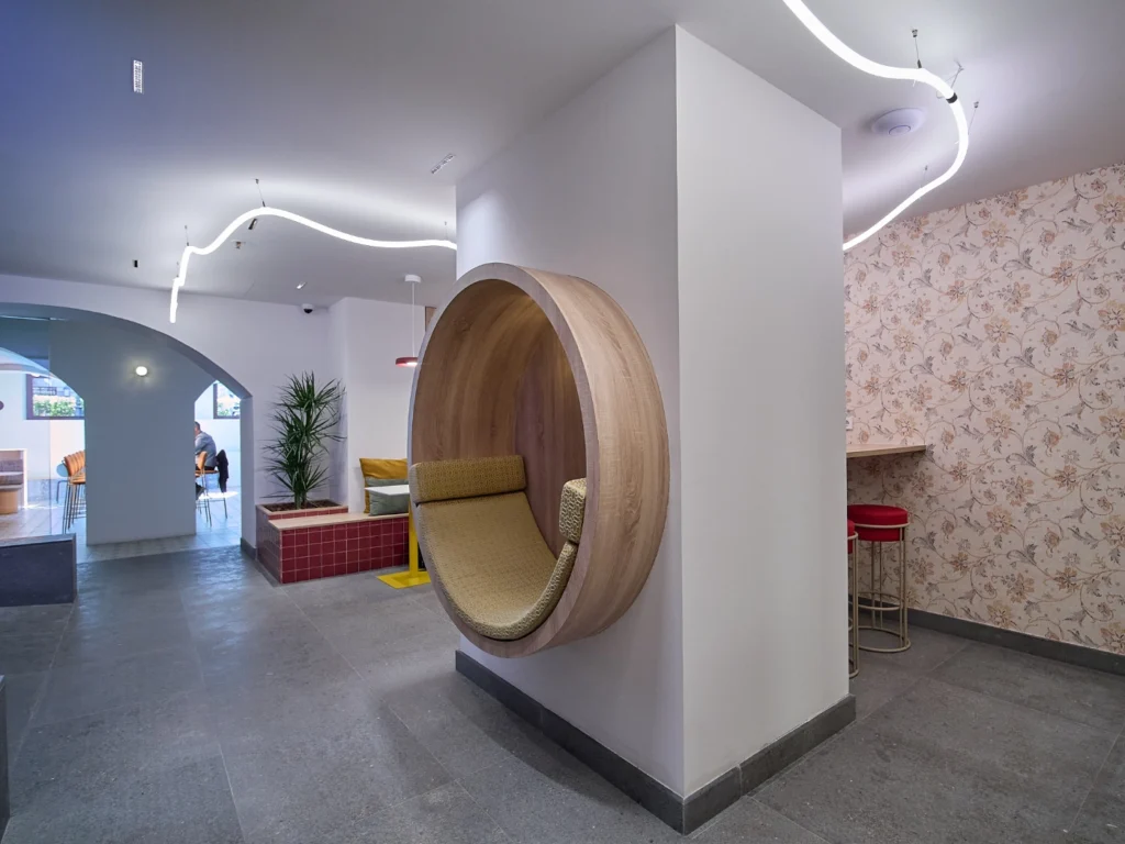  The exclusive and boutique atmosphere of a leading coworking center in Barcelona, offering a unique work environment.
