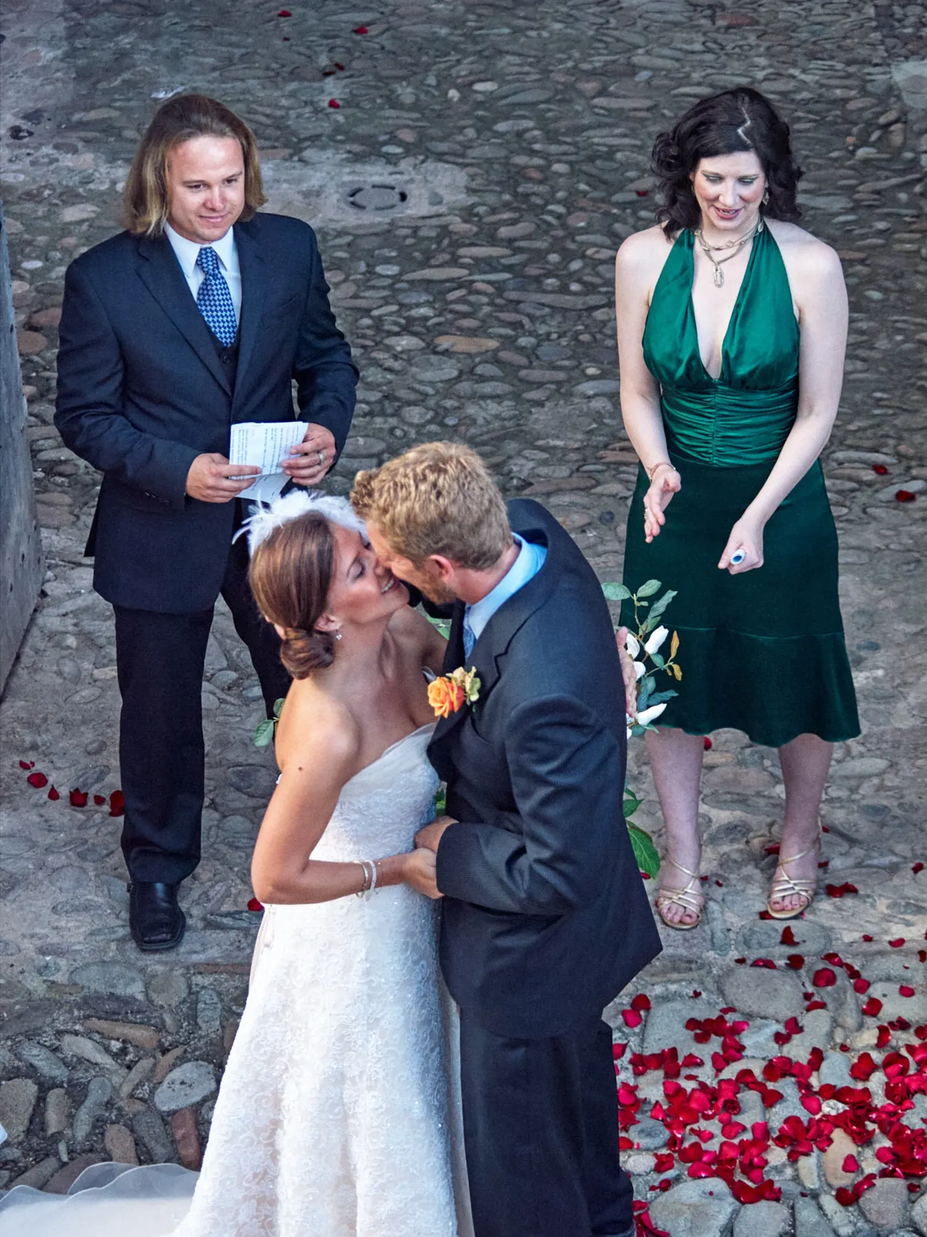 Bride and groom kissing after their ceremony at Can Tallada