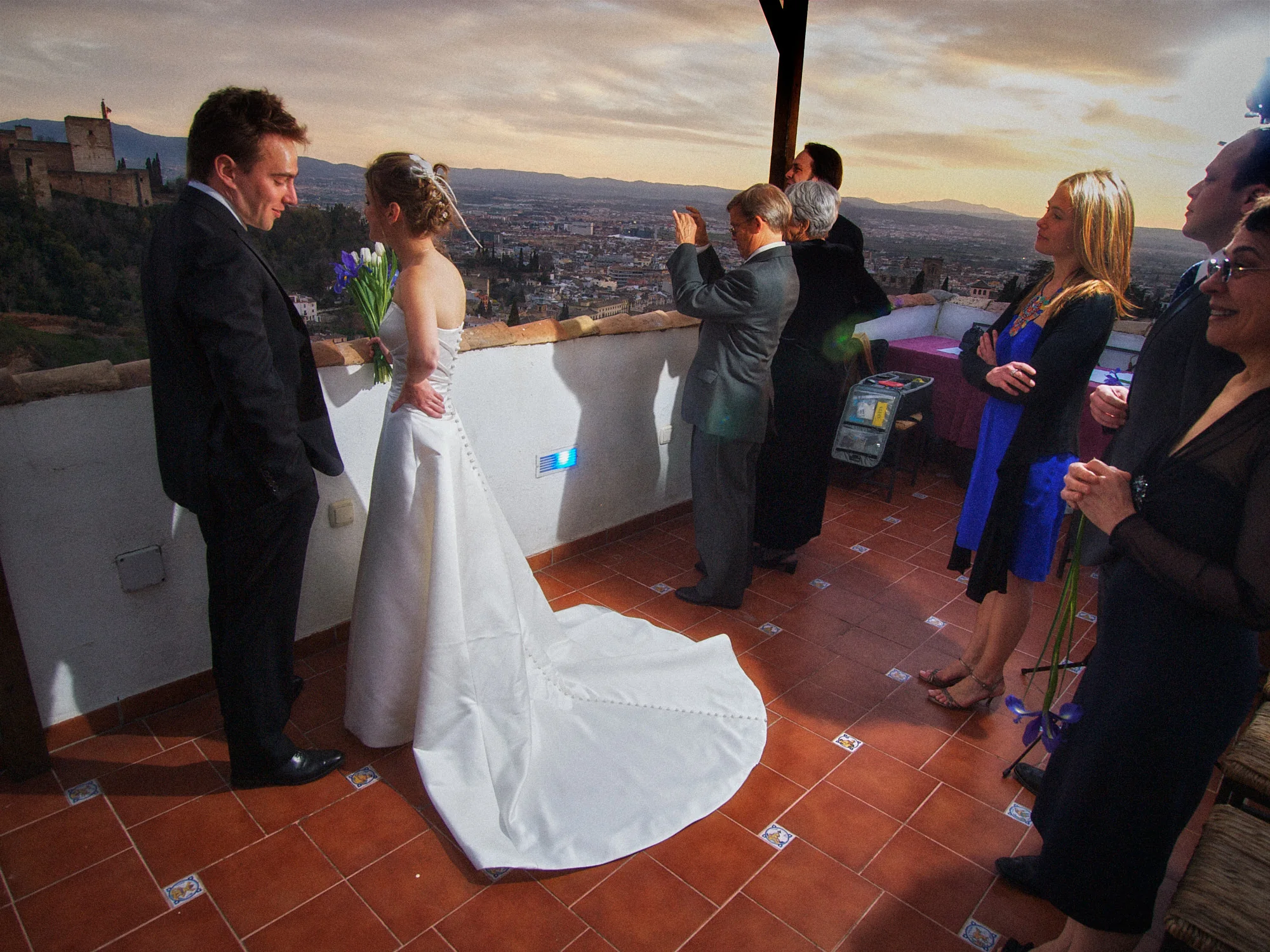 Drea and Brian during their intimate Granada wedding ceremony at sunset
