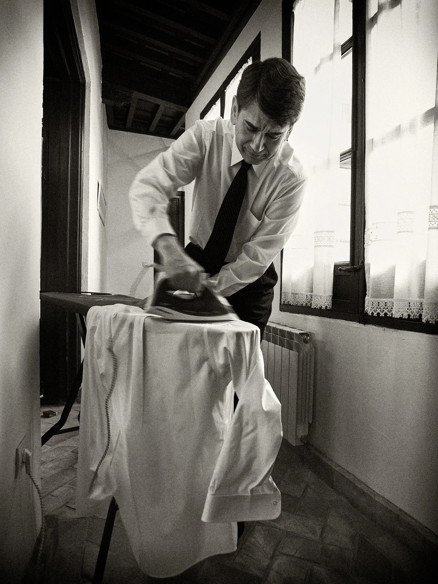 Drea & Brian Granada Wedding – Groom Preparations Brian preparing for the wedding ceremony in Granada
