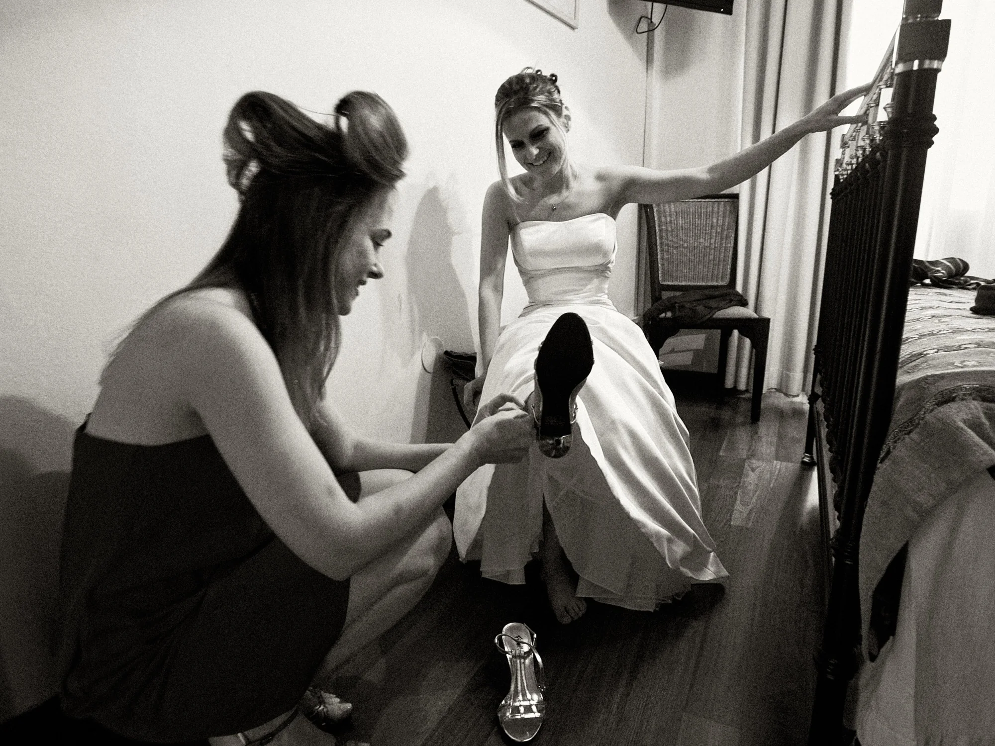 Drea & Brian Granada Wedding – Bride Preparations Drea putting on her wedding shoes during preparations in Granada