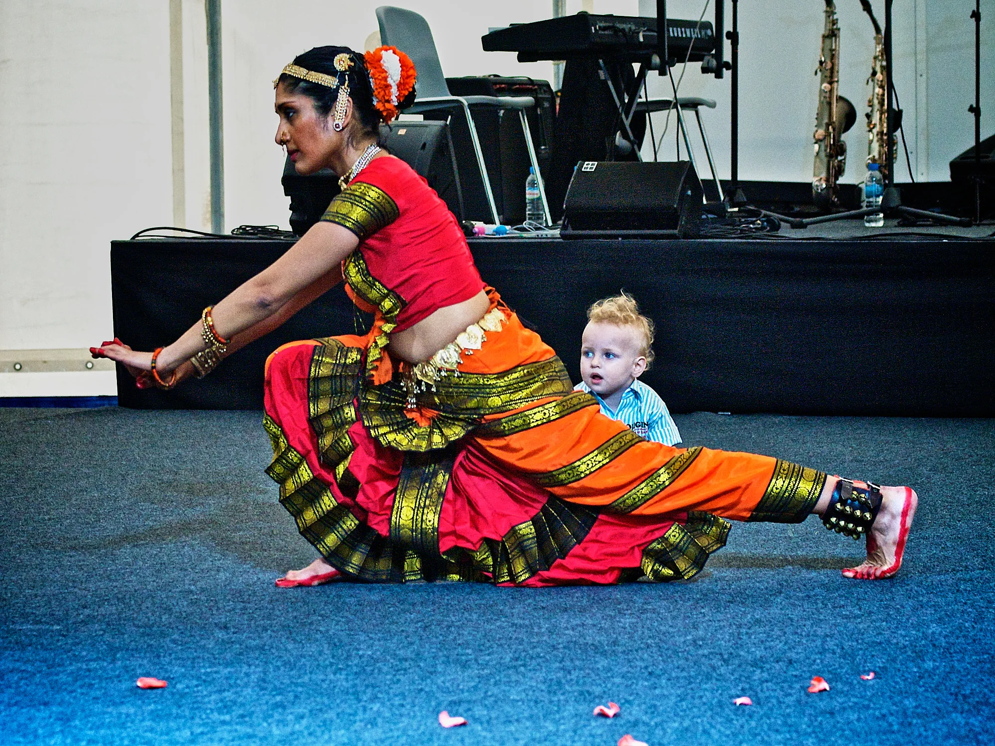 Emily & Regis Cardona Wedding – Forum Performance A dancer in colourful dress performing at Emily and Regis’ pre-wedding Forum celebration