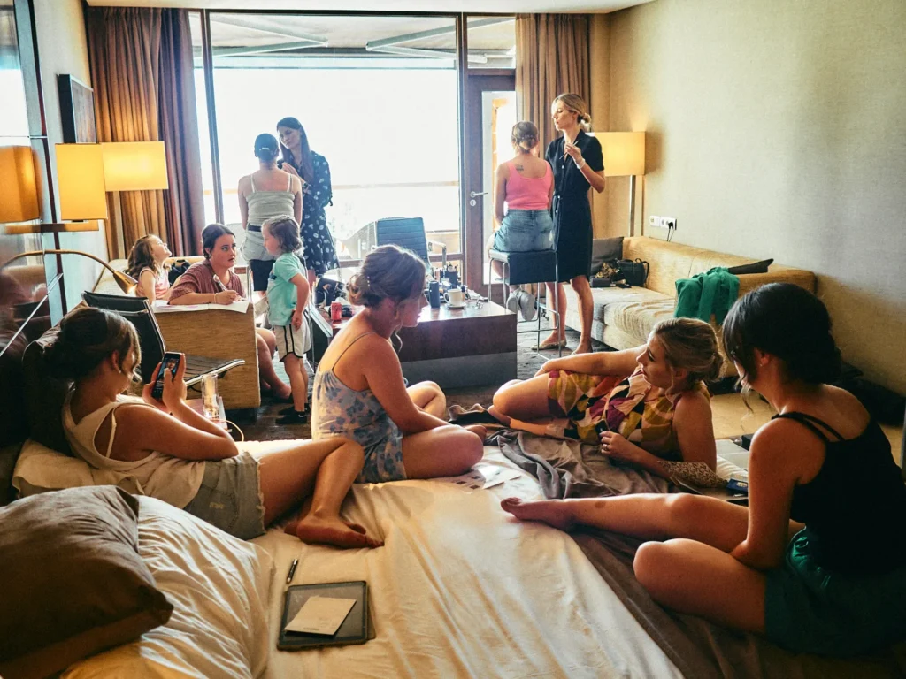 Jade and friends during wedding preparations in a Hotel Miramar suite in Barcelona