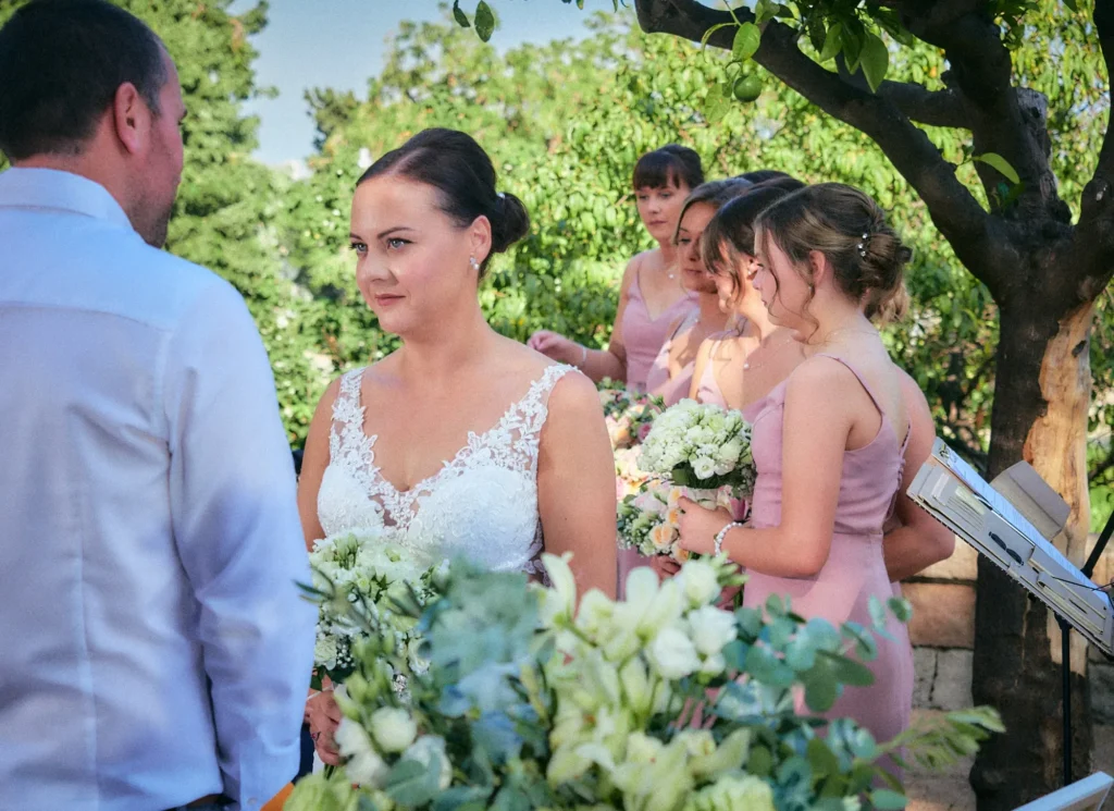 Jade greeting guests during her Hotel Miramar wedding on Montjuïc