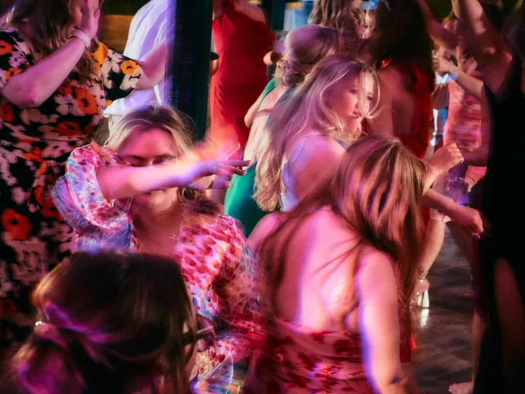 Wedding guests dancing during the evening party at Hotel Miramar in Barcelona
