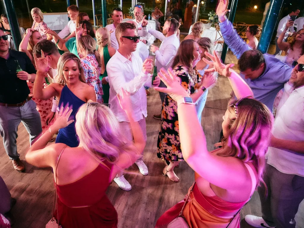 Wedding guests filling the dance floor during Jade and Aidhan’s evening party