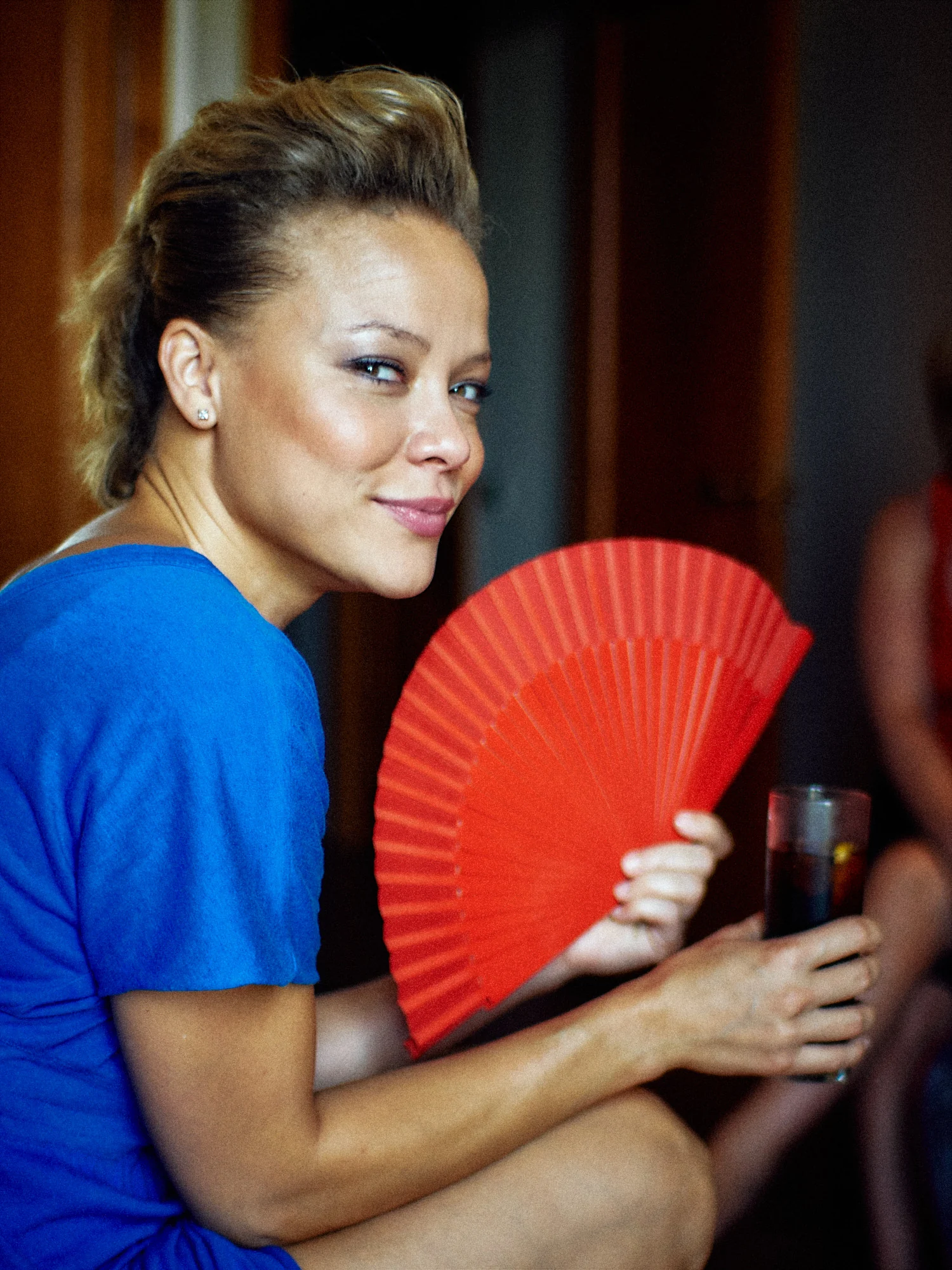 Jose and Kristy’s Barcelona Wedding – Red Fan Wedding guest holding a red fan during the Barcelona wedding celebration