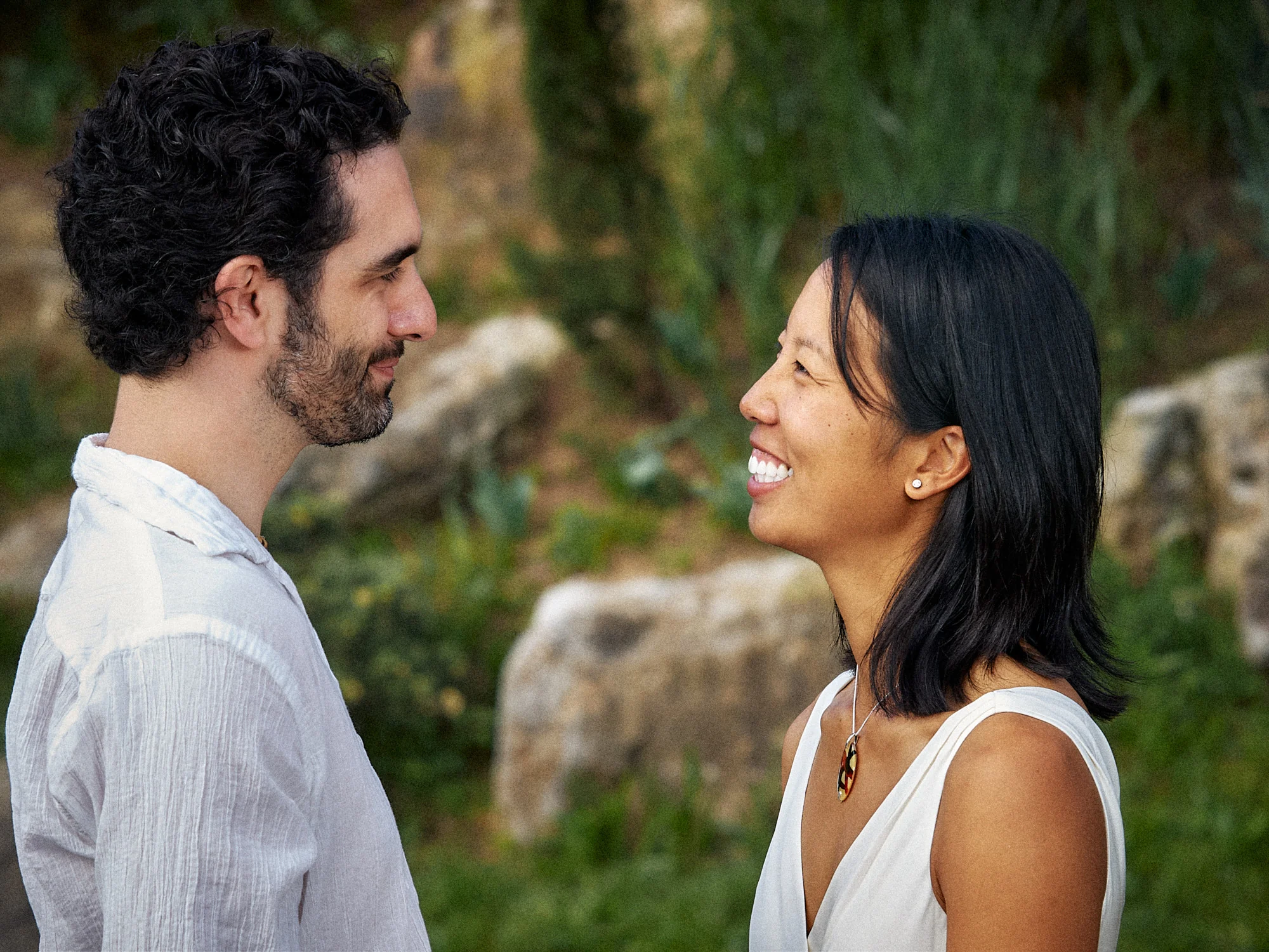 Rod and Vanessa smiling at one another during their Montjuïc vow exchange