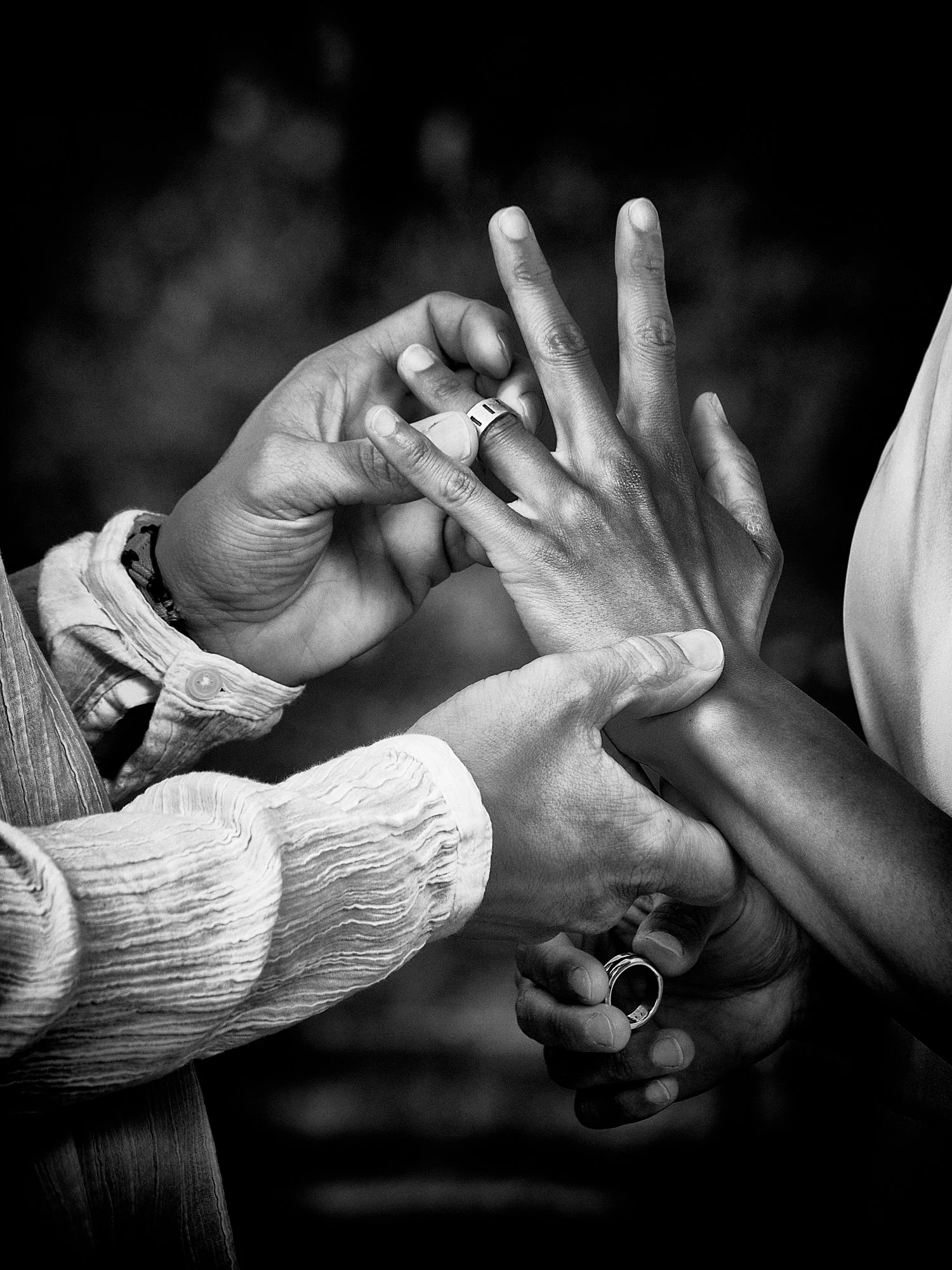 Rod and Vanessa holding hands during their intimate wedding ceremony
